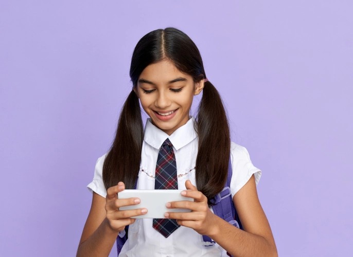girl playing with phone
